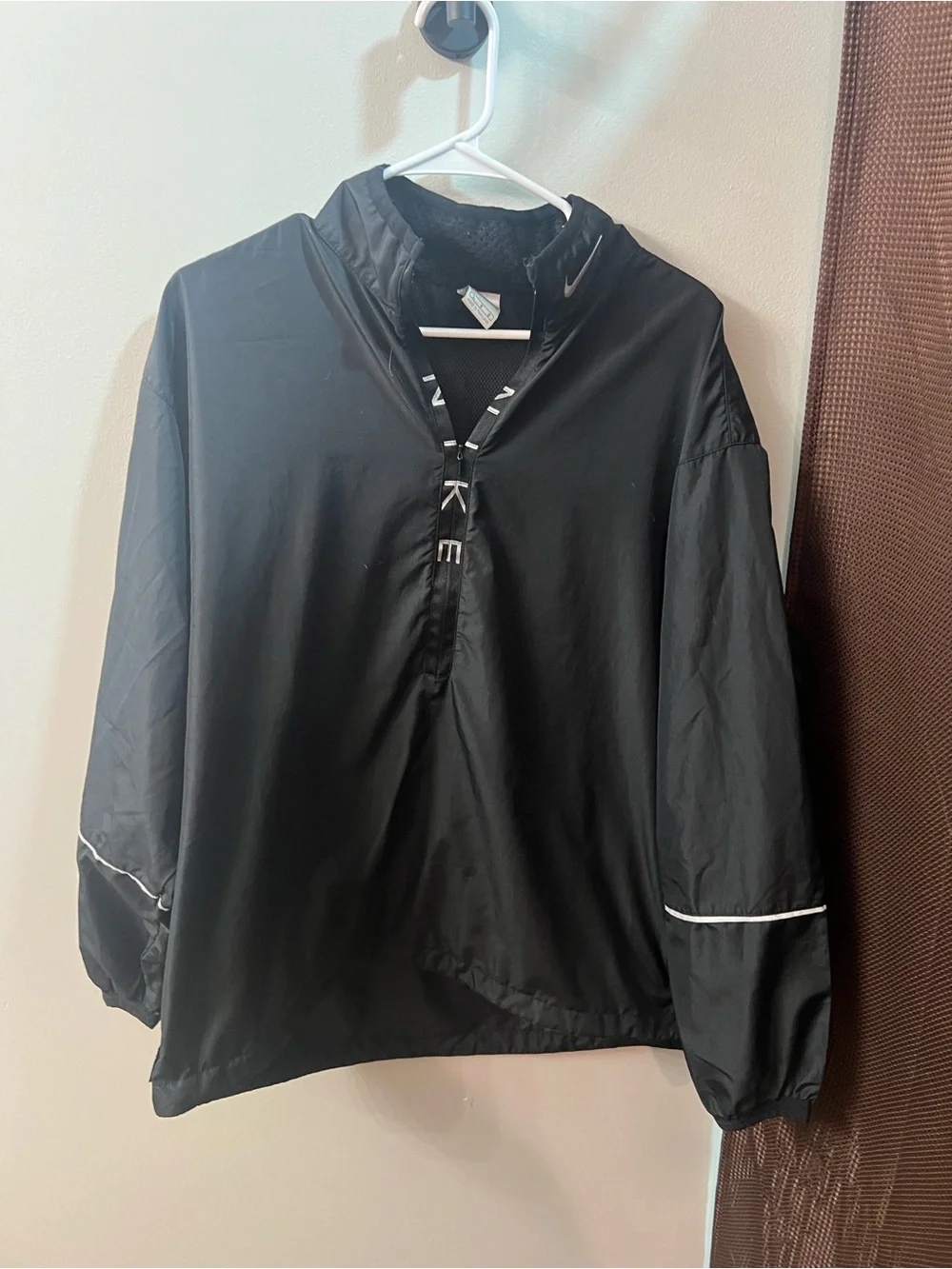 Nike Black Jacket with Red Swoosh Detail